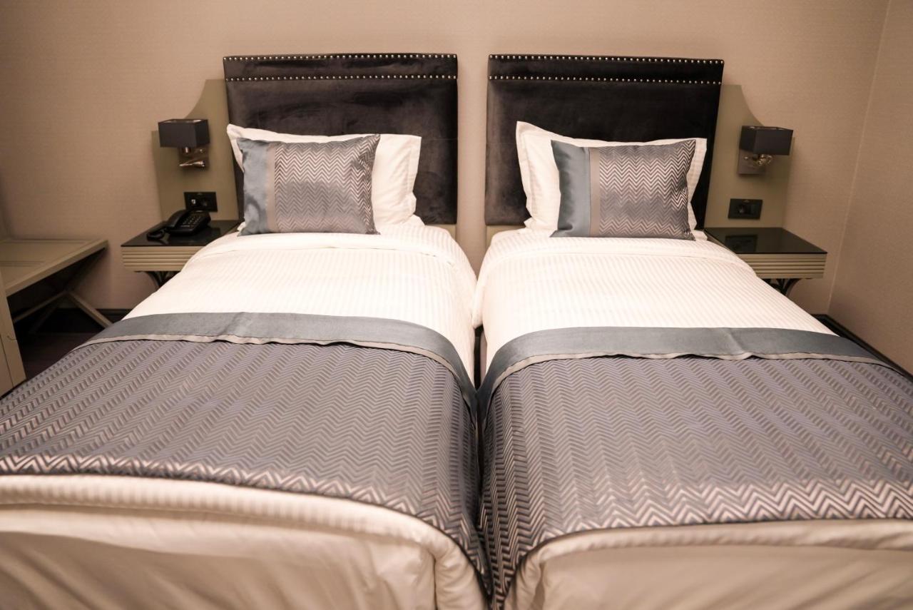 Tweepersoonskamer met 2 Aparte Bedden